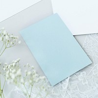 Blank blue card with white flower branch