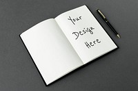 Blank notebook with a black pen mockup