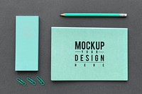 Set of blue stationery on workspace