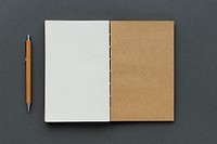 Blank opened notebook with a pencil mockup