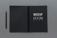 Black notebook with a pencil mockup