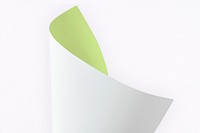 Blank green and white folded paper on a gray background