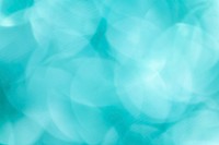 Shiny blurry turquoise glitter textured background