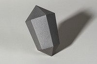 Gray hexagonal prism paper craft on a gray background