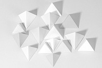 3D gray pyramid paper craft on a gray background