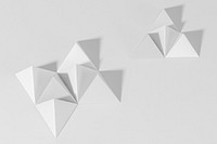 3D gray pyramid paper craft on a gray background