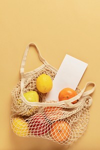 Reusable net bag full with fruits 