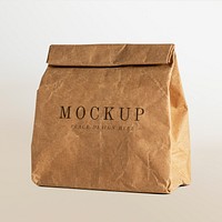 Rolled brown paper bag mockup with copy space