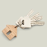 Wooden keychain on green background