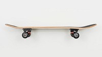 Side view of a wooden skateboard on white background