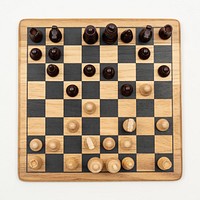 Wooden chess board on an off white background