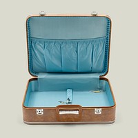 Unlock vintage brown leather briefcase on green background