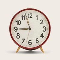 Vintage analog alarm clock mockup on a beige background
