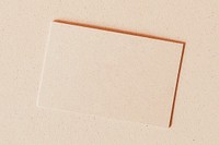 Blank business card on beige background