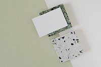 Blank white name card on granite cubes