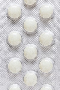 White pills in an aluminum foil blister