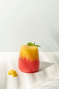 Layered mango and strawberry smoothie