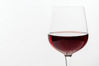 Red wine in a glass on white background