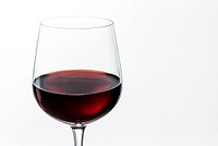 Wine glass with red wine closeup 