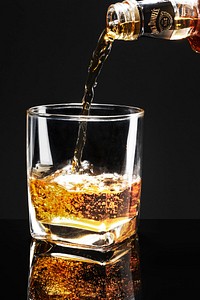 Pouring whisky into a glass