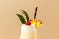 Pina Colada with pineapple and cherry on top