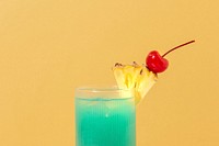 Blue Hawaii cocktail with pineapple and cherry