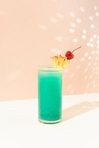 Blue Hawaii cocktail with pineapple and cherry