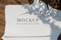 Flower shadow on a ripped white paper mockup