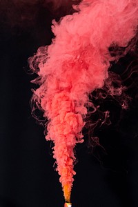 Coral red smoke effect on a black background