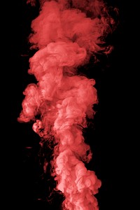 Coral red smoke effect design element on a black background