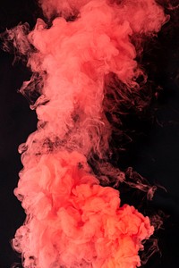 Coral red smoke effect on a black background