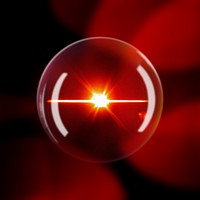 Red lens flare effect in a bubble design element on a dark background