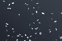 Silver confetti pattern design element on a dark background