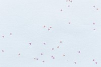 White paper decorated with small hearts textured background