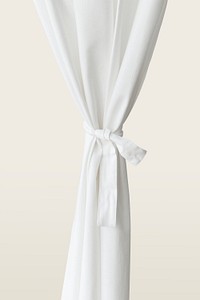 White drapery hanging from a curtain rod