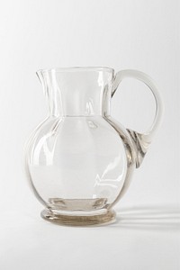 Empty transparent glass jug on gray background
