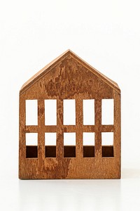 Wooden house model on white background