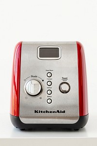 Front view of a red KitchenAid bread toaster. MAY 27, 2020 - BANGKOK, THAILAND