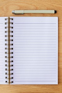 Blank plain white notebook page with a pen mockup