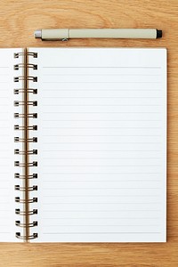 Blank plain white notebook page with a pen