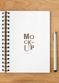 Blank plain white notebook page with a pen mockup