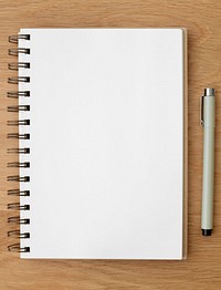 Blank plain white notebook page with a pen