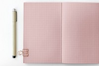 Pink grid patterned notebook page with stationary mockup