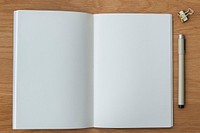 Blank plain notebook page with stationary mockup