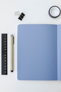 Blank plain notebook page with stationary mockup