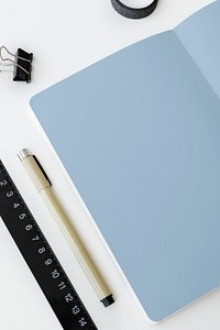 Blank plain notebook page with stationary mockup