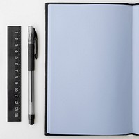 Blank plain blue notebook page with a pen mockup