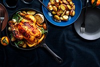 Holiday dinner table mockup with roasted chicken and potatoes food photography psd