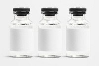 Three injection vial bottles with psd label mockups