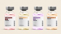 Vitamin injection glass bottles on beige background